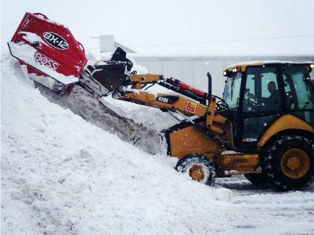 Commercial snow plow removal
